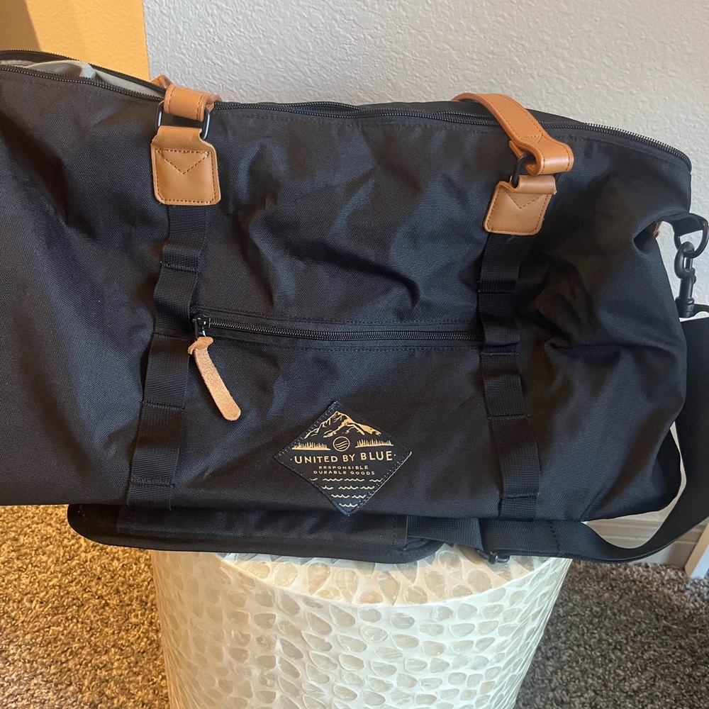 REI Black Duffel Bag with Tan Accents
